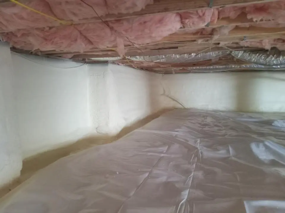 Crawl space encapsulation with closed-cell spray foam for Storm Damage Roof Repair in Muskegon